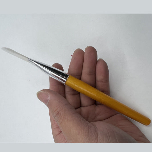 Wooden handle antistatic dust cleaner brush for delicate watch repair and maintenance.