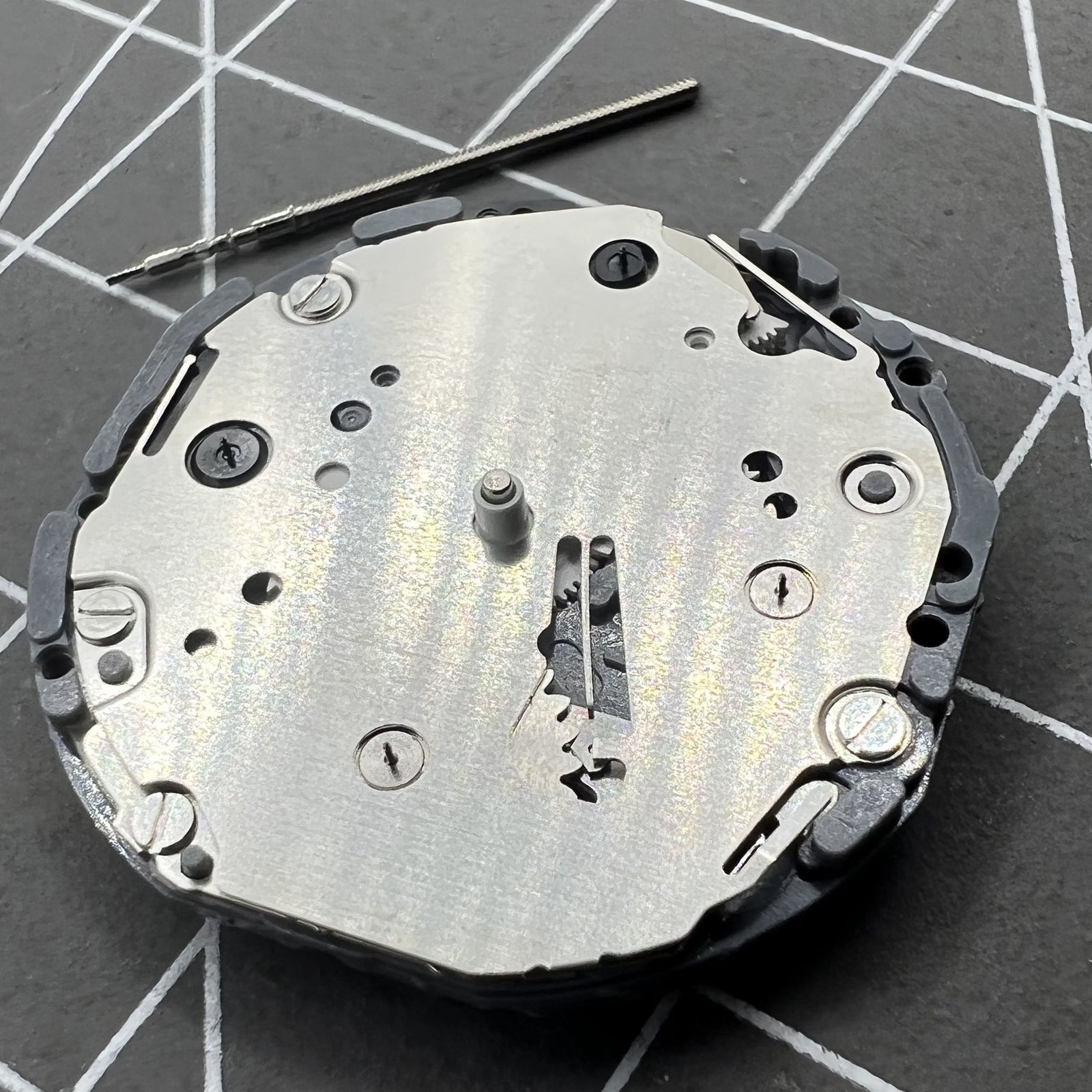Hattori Epson TMI VD84A quartz watch movement for precise timekeeping in watch accessories.