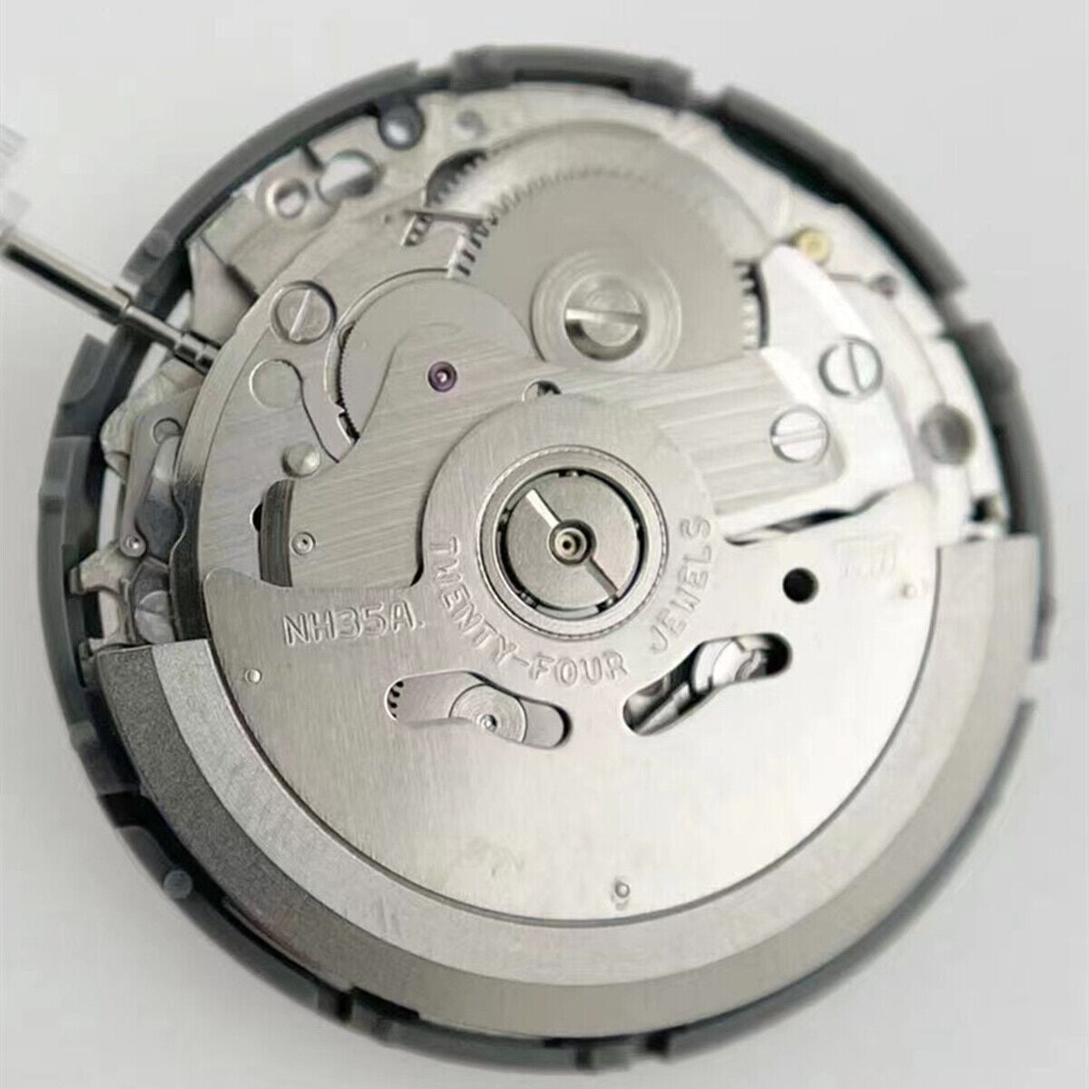 NH35 black automatic watch movement with date display at 6 o?clock, precision mechanical parts by Seiko.