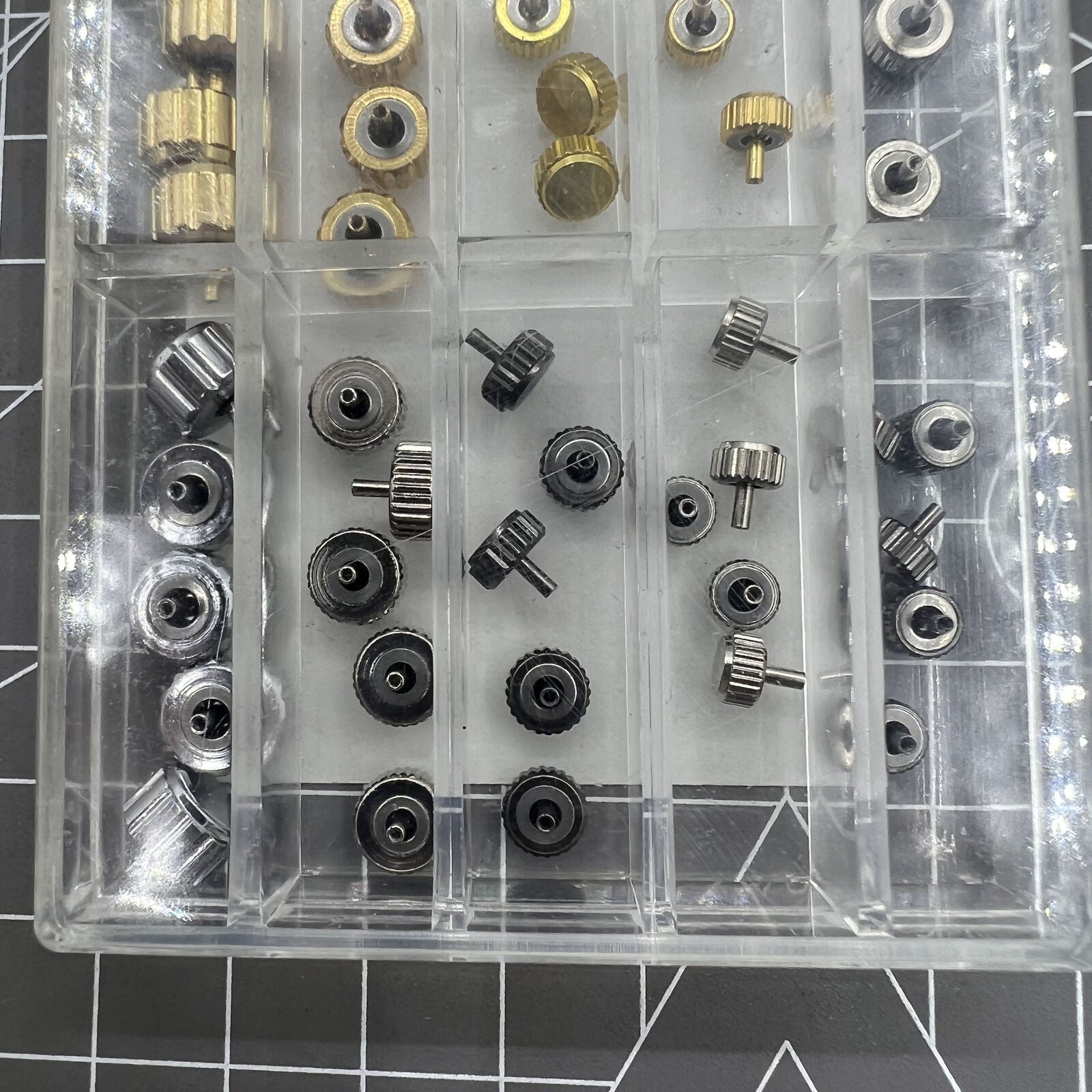 Assorted 50PCS waterproof watch crowns in gold, silver, black for repairs.