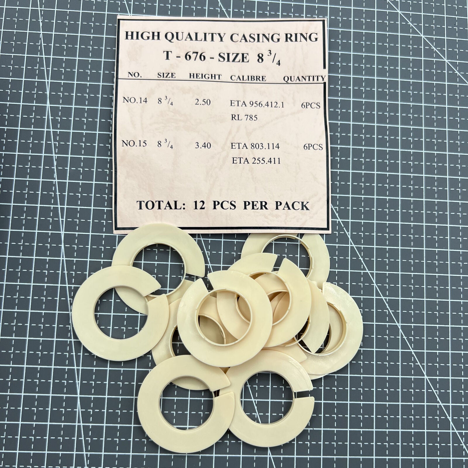 Set of 12 T-676 watch movement casing rings, size 8.75, for precise spacer alignment.