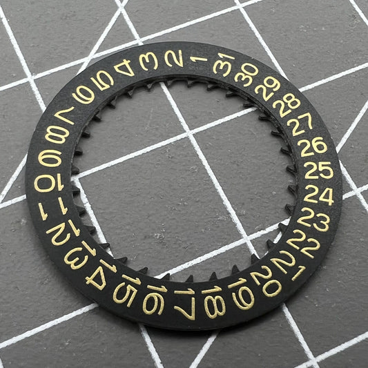 Golden Character date wheel on black background for NH35 NH36 watch movement, enhancing time display accuracy.