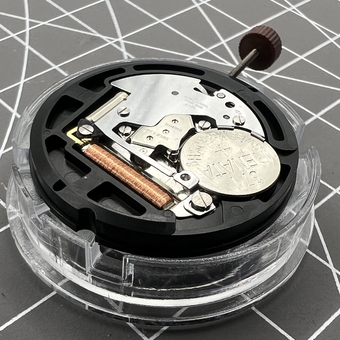 Swiss Ronda 509 quartz watch movement with black date disk at 3, ideal for precise watch accessories.