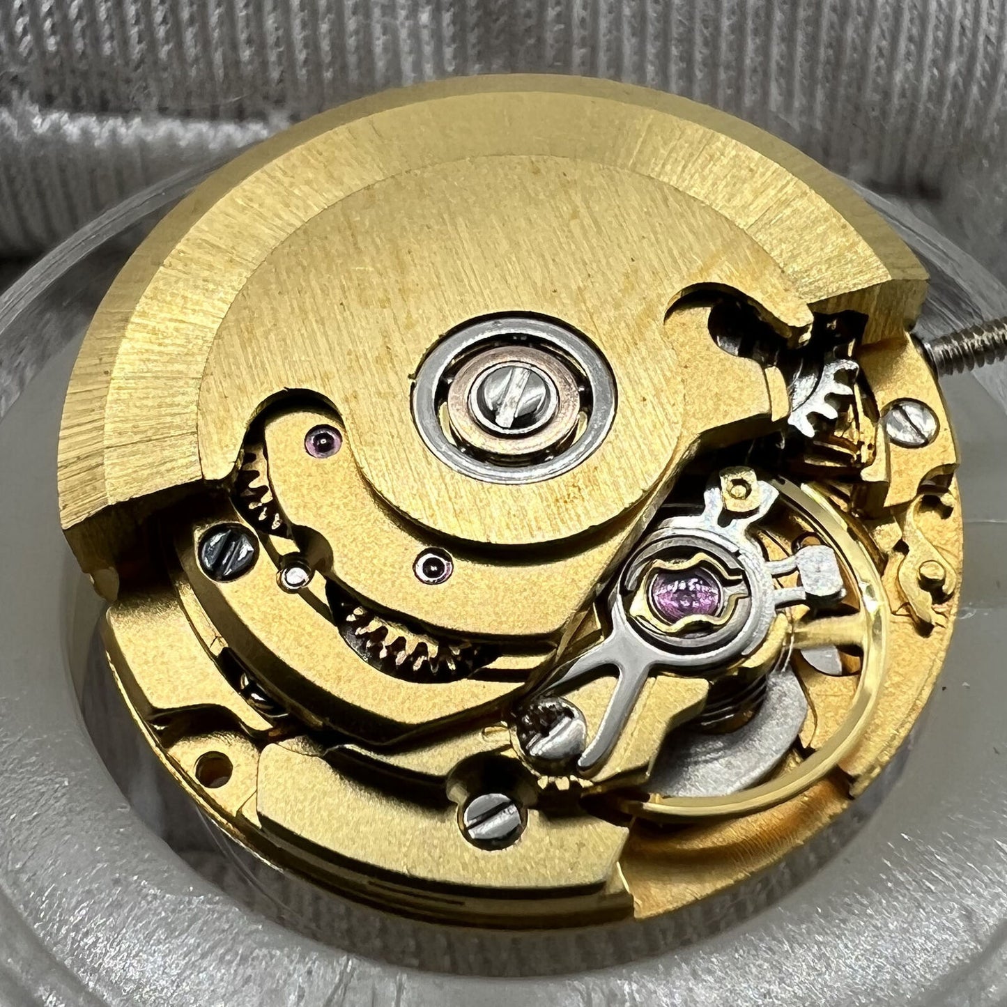 Gold mechanical watch with date display at 3 o'clock, featuring ETA2671 compatible replacement part.