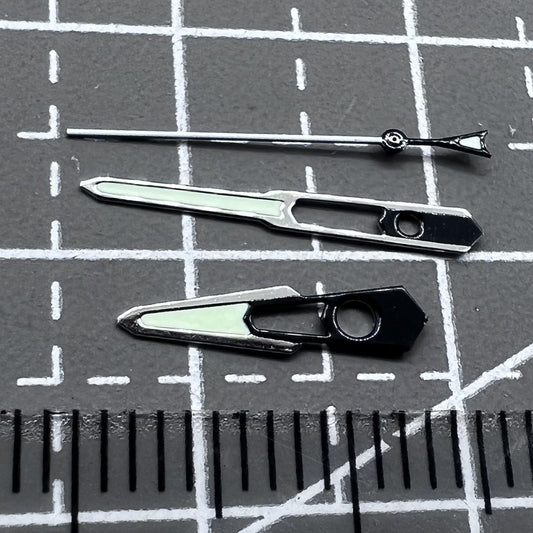 Silver and black trimmed 13mm hollow watch hands with green lume for NH35 NH36 movements, precision crafted.