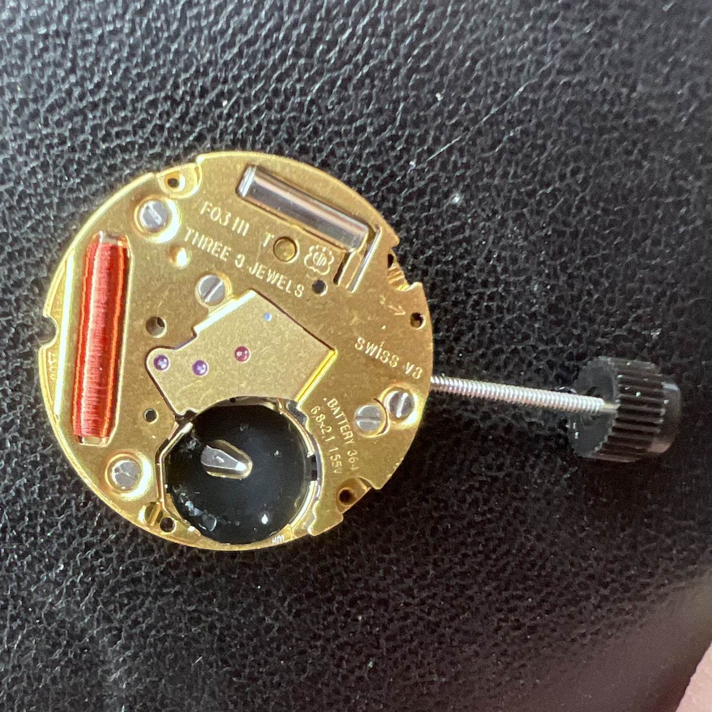 Swiss ETA F03.111 quartz watch movement with 3 hands and date at 6 o'clock, precision timekeeping.