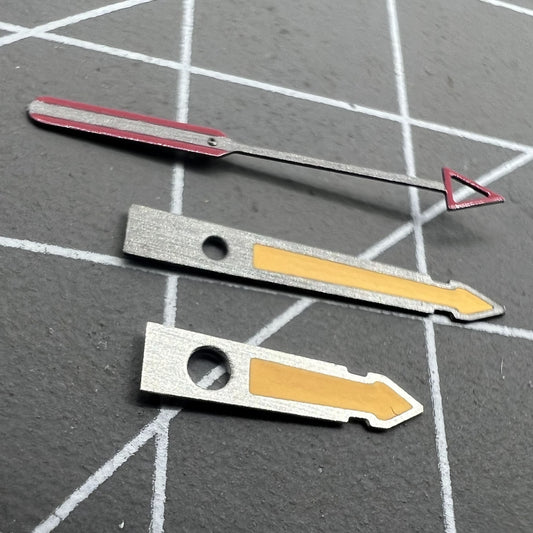 Arrow-shaped yellow luminous watch hands with black trim, compatible with NH35, NH36, 4R, and 7S movements.