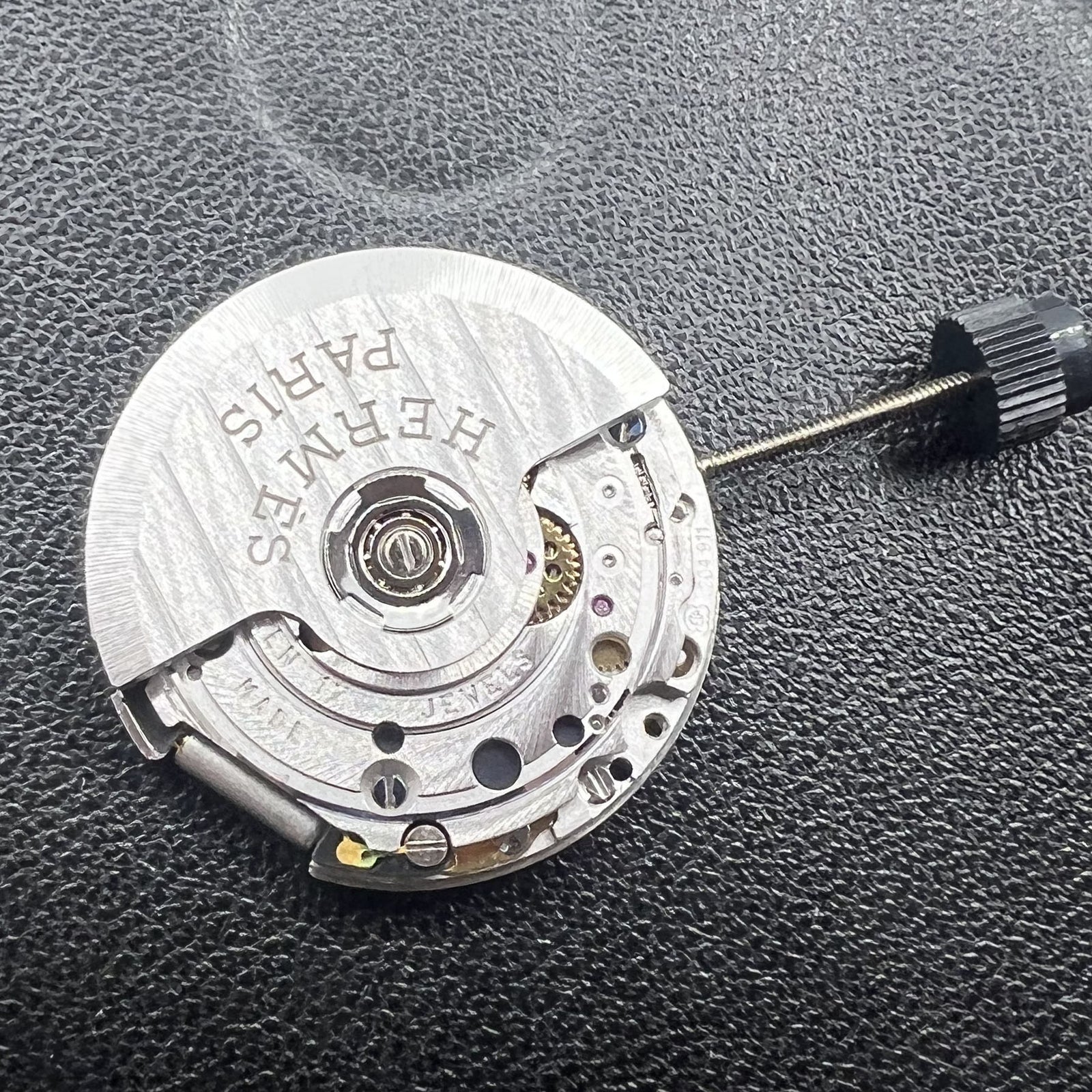Swiss ETA 204.911 automatic watch movement showcasing precision engineering by ETA for reliable timekeeping.