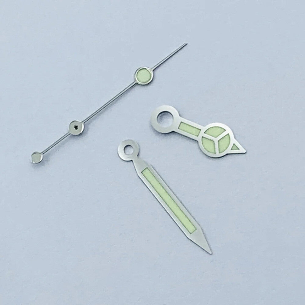 Green luminous watch hands with silver trim for NH35 NH36 movements, ideal for watch repairs.