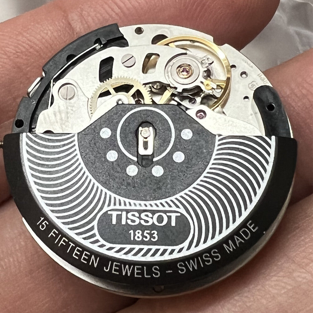 Swiss Made ETA C01.211 chronograph watch movement with black dial, mechanical precision by Tissot 1853.
