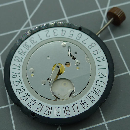 Swiss Ronda 515 quartz watch movement with date display at 6 o'clock, precision timekeeping accessory.