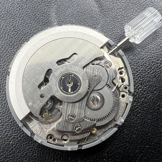 NH36A watch movement with white dial, blue lume, 3/3.8 crown positions by Seiko for precise timekeeping.