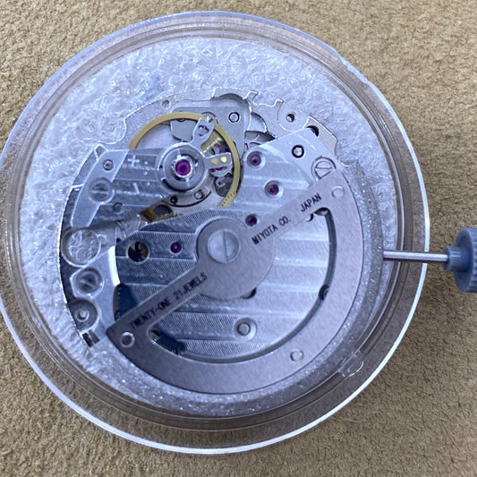 Silver Miyota 8245 automatic mechanical watch movement, Japan made, for precision repairs and upgrades.