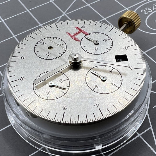 Black Dandong 7753 watch with automatic mechanical movement and small second dial at 9 o?clock.