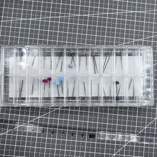 Assortment of 38 Original Ronda watch stems in 19 sizes, ideal for watch accessory repairs and replacements.