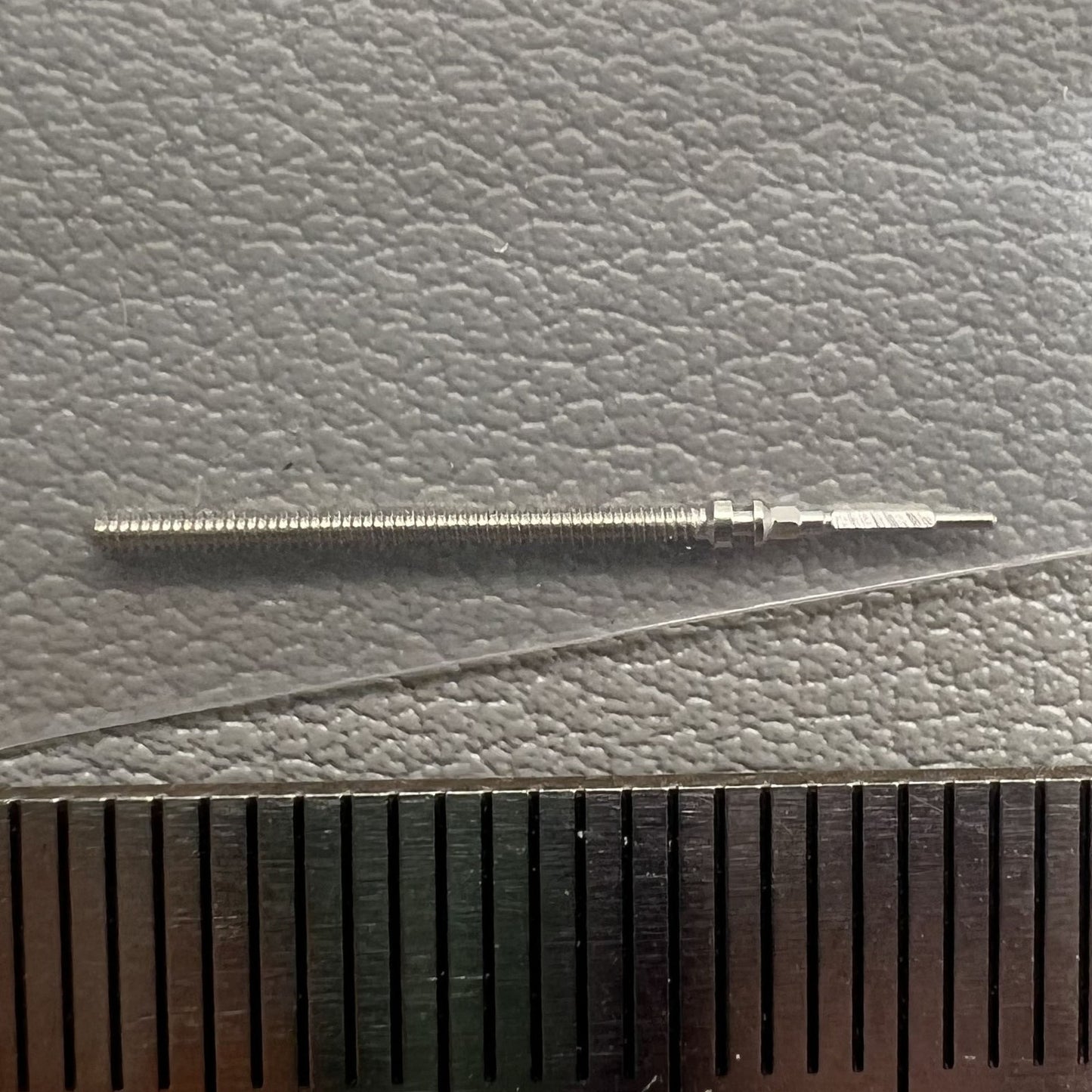Set of two generic watch stems compatible with NH05 NH06 movements, ideal for repair and replacement.