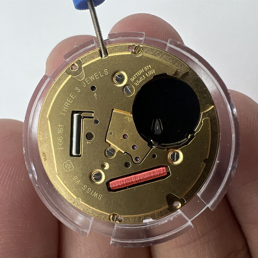 ETA F06.161 quartz watch movement with 3 hands, white dial, date windows at 3 and 6 by ETA.