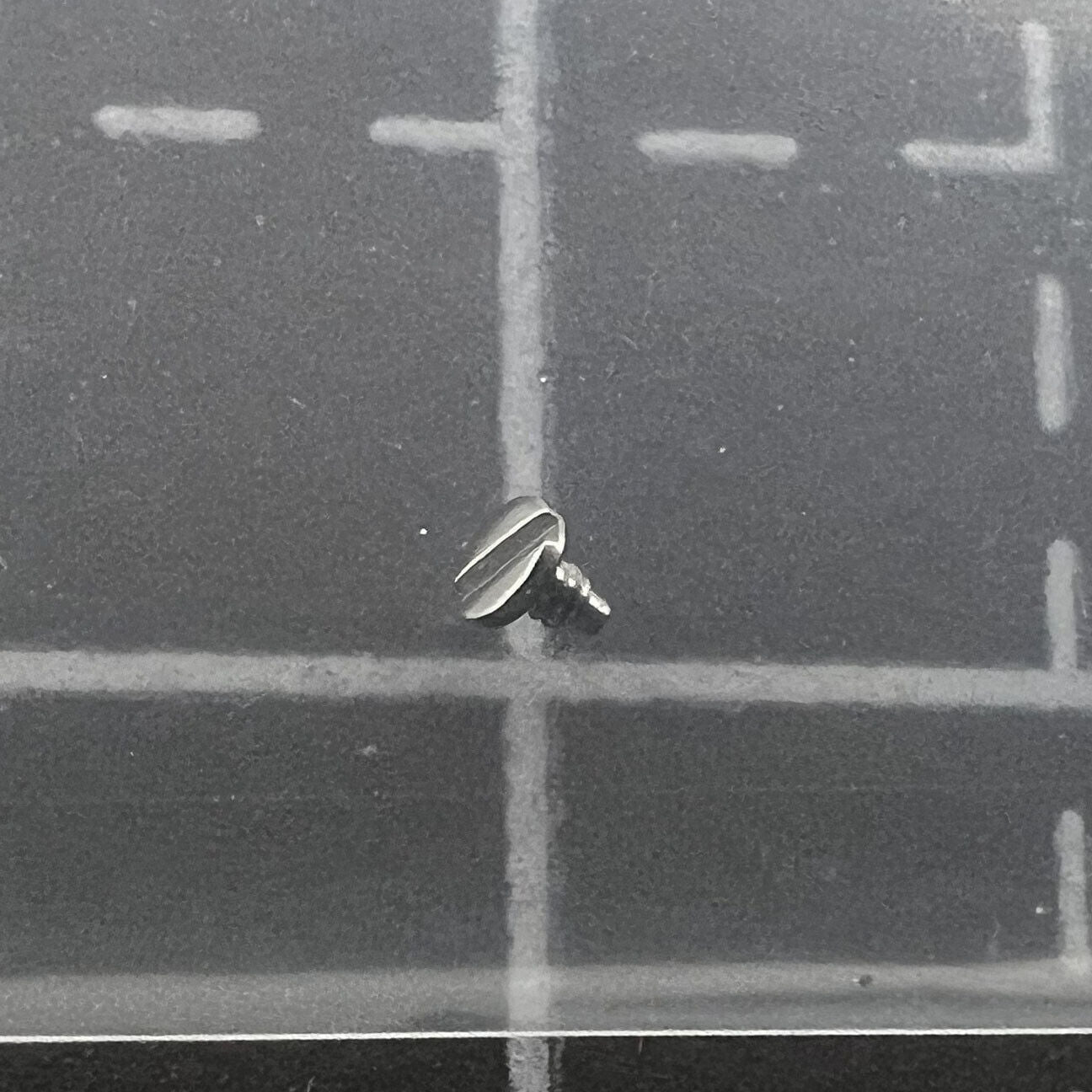 Rolex Ref.3135-5115 screw for pallet bridge replacement, precision RLX3135 watch movement part.
