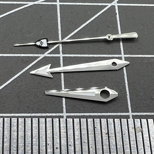 Silver pointed second hand with green lume, compatible with NH35/36 movements, for precise timekeeping.