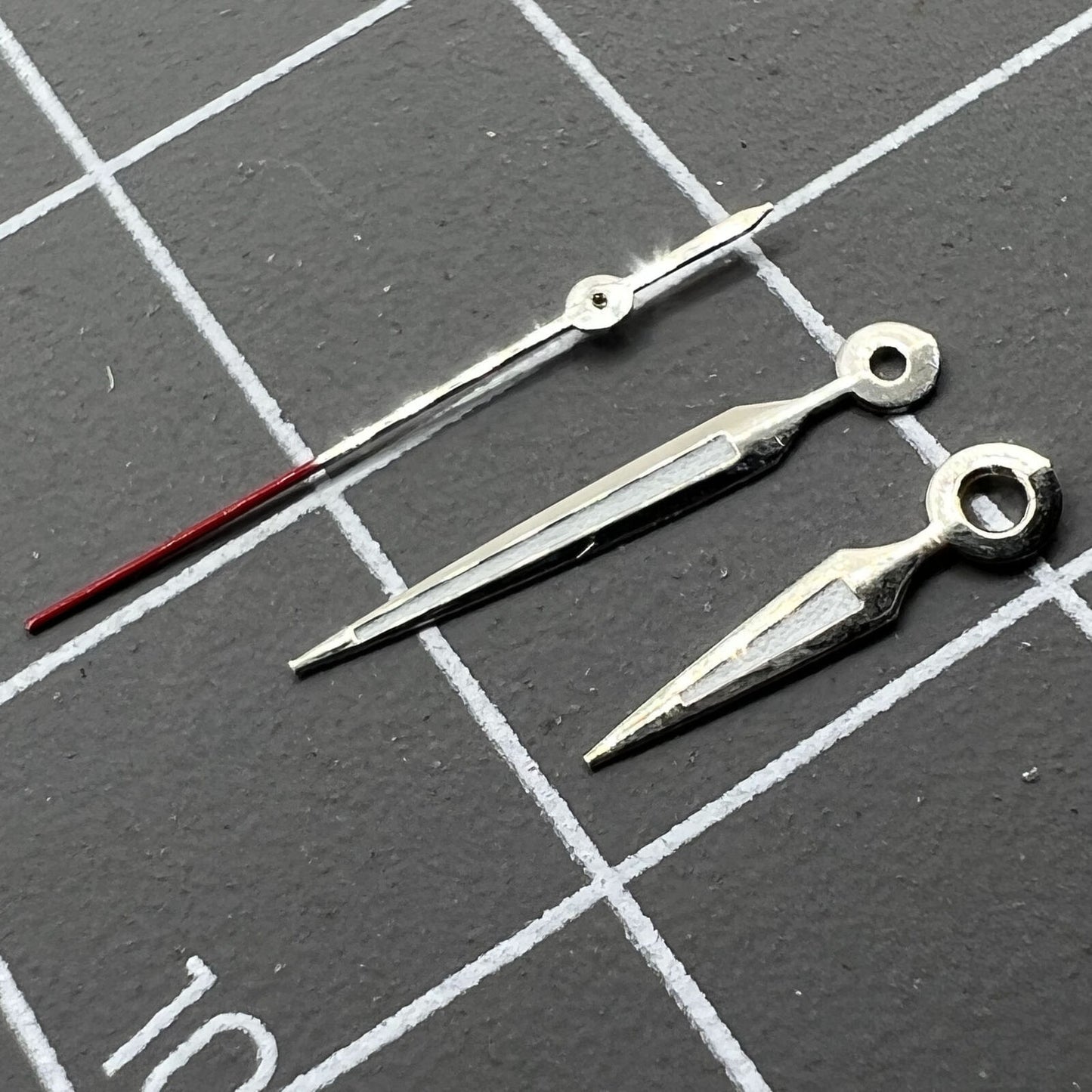 Luminous arrow-shaped watch hands for Miyota 2035 quartz, improving night-time readability.