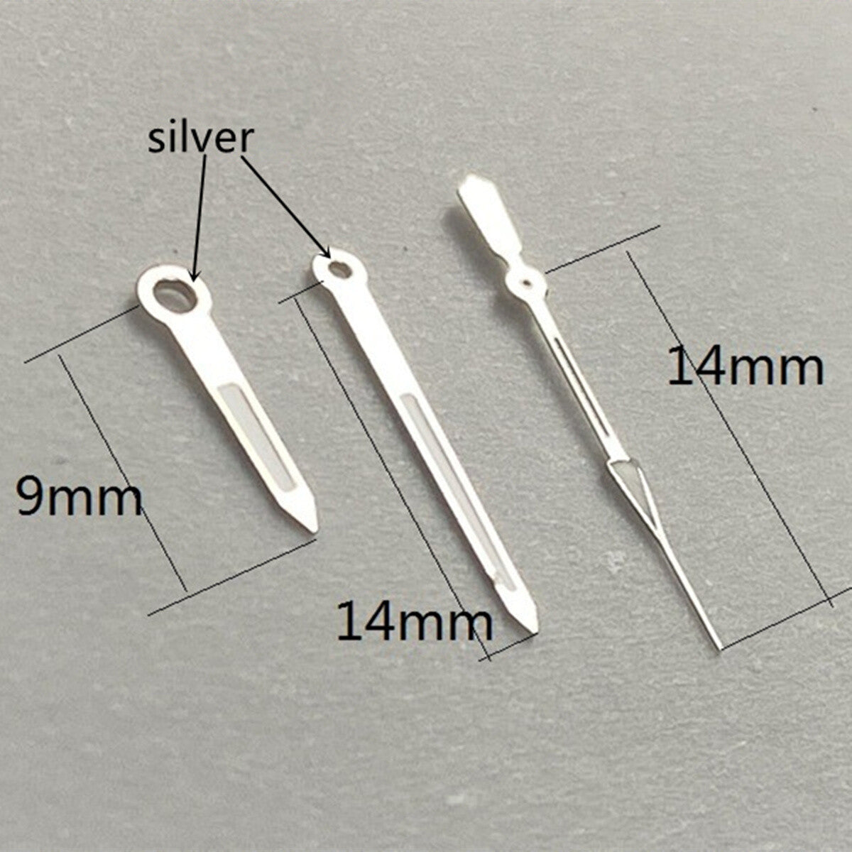14mm silver trim watch hands with green lume for Ronda 515 quartz, enhancing visibility and style.