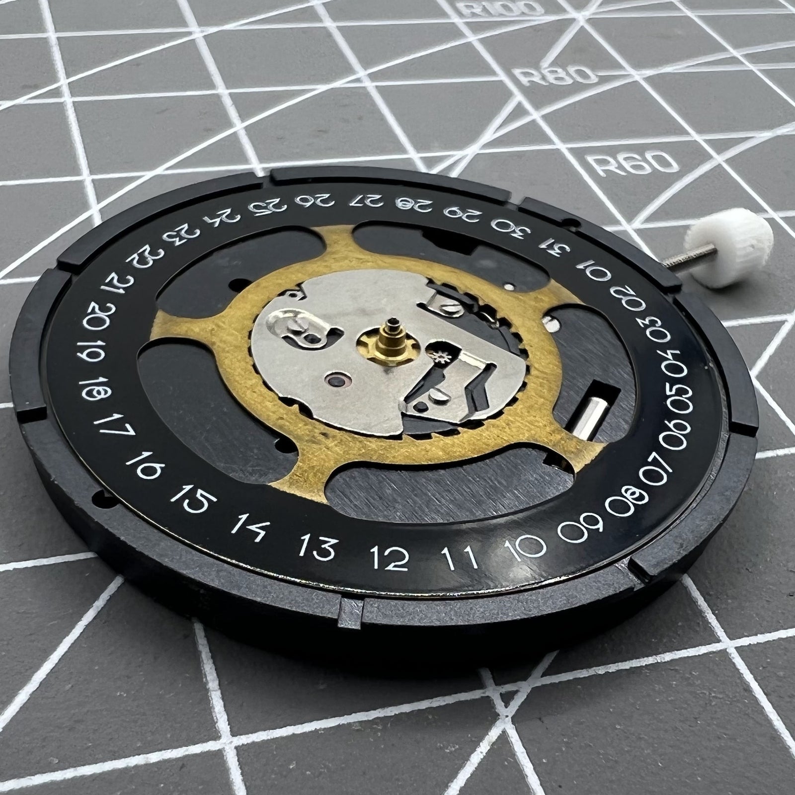 Black dial quartz watch movement replacement ISA 2334/1035 for precise timekeeping by ISA.