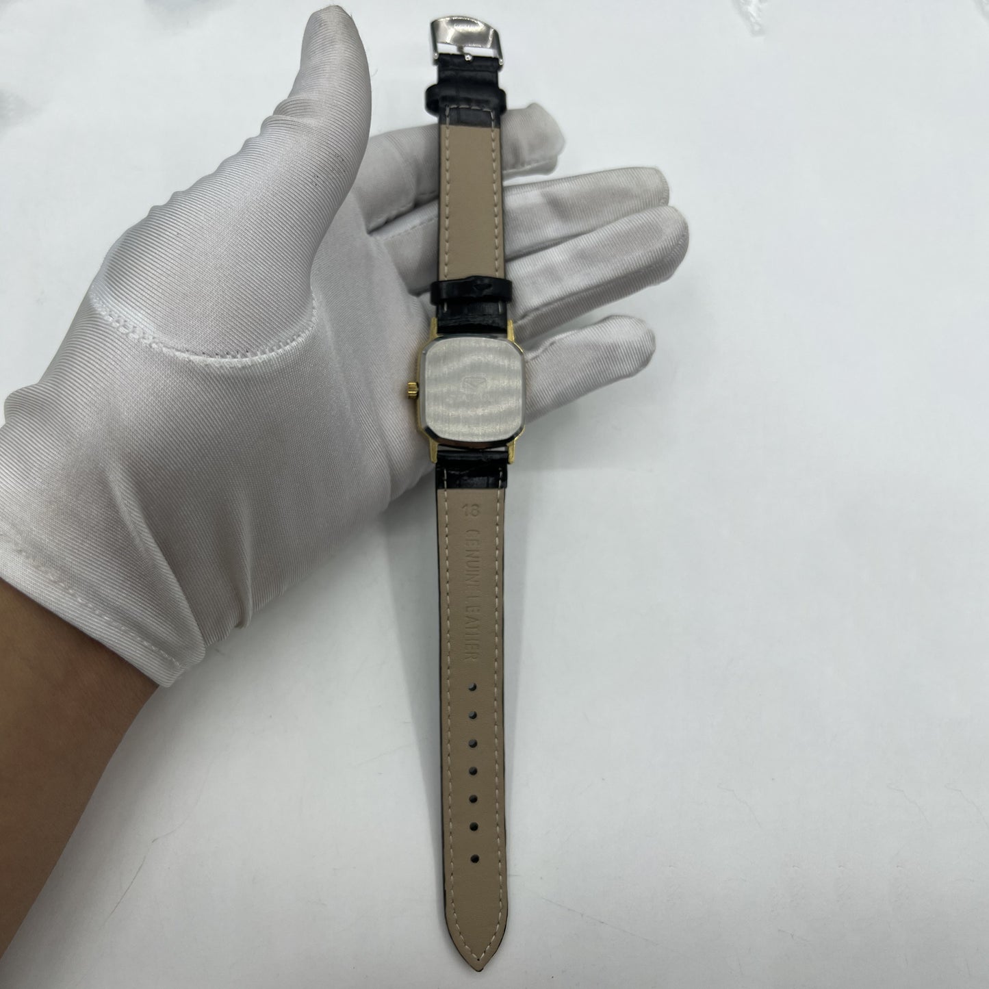 Seagull 28mm ladies watch with golden square case, manual mechanical movement, stylish and elegant design.