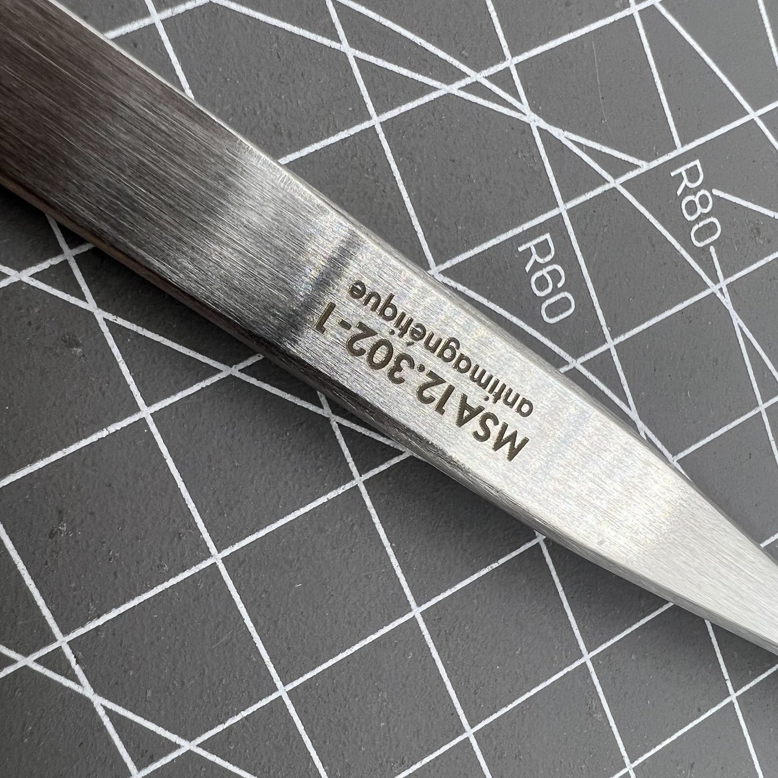 Horotec MSA12.302-1 Swiss Made antimagnetic tweezer for precise watch repairs and accessory handling.