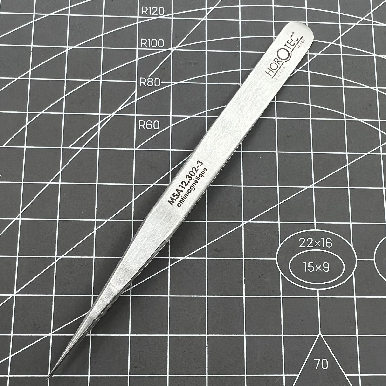 Swiss Horotec antimagnetic fine tweezers for delicate hairspring handling in watchmaking.