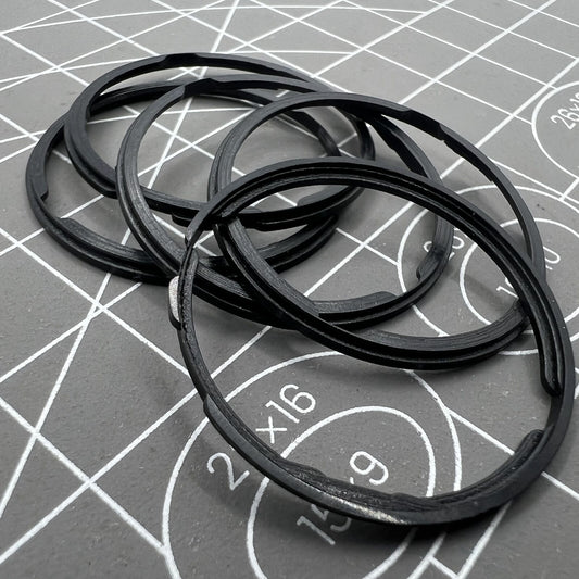 Black cushion mount spacer ring by Orient, designed to securely fix 46943 movement watch dials.