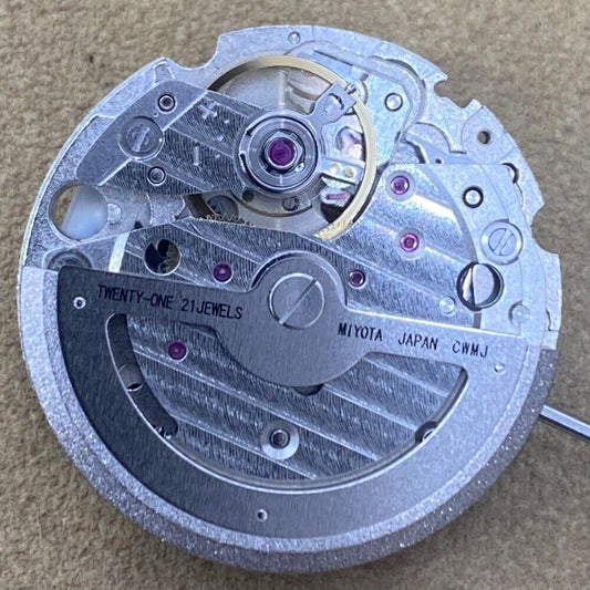 Japan Made Miyota 8217 watch movement with 3 hands and small second at 9, precision watch part.