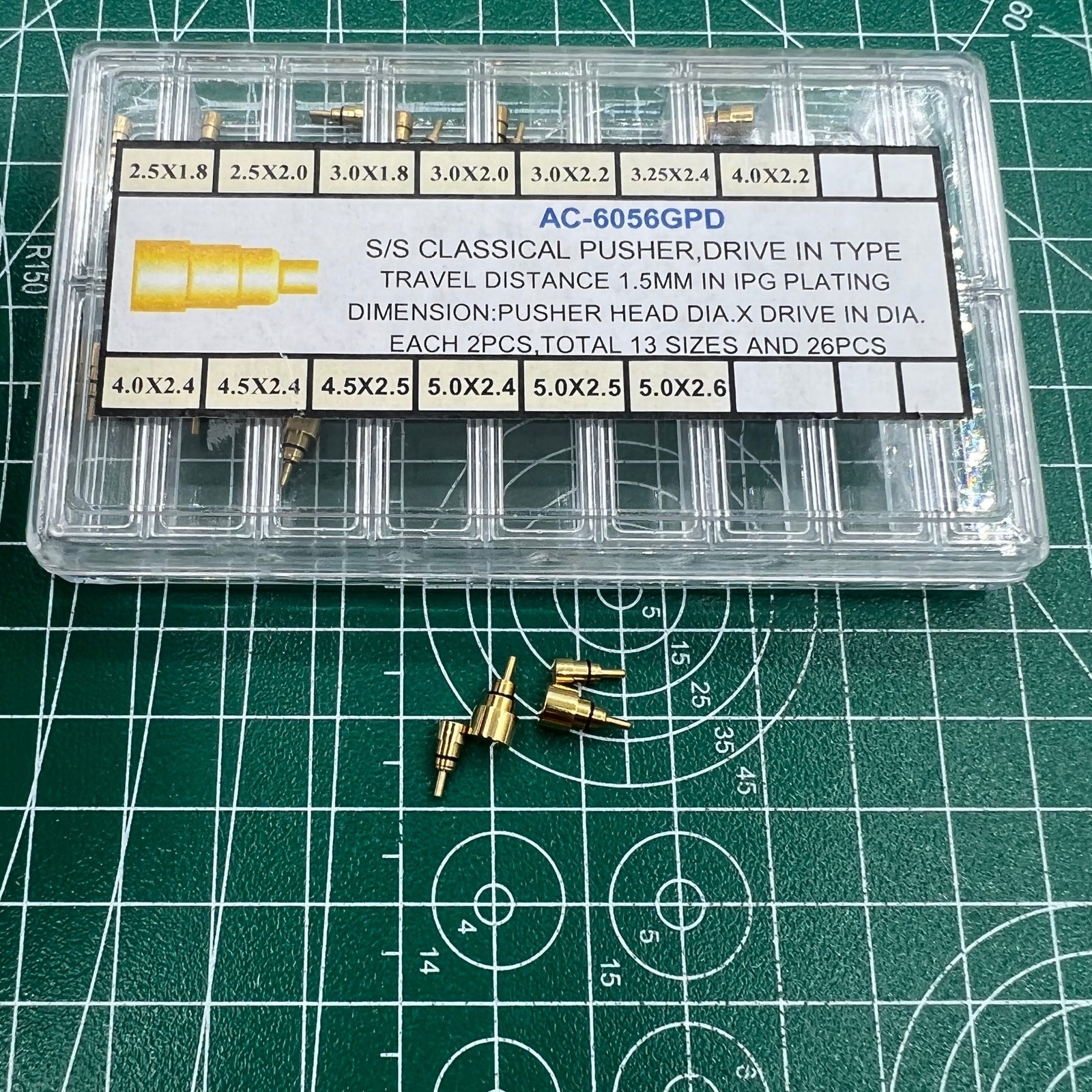 Golden stainless steel watch accessory from Wholesale Watch, featuring classical pusher drive design in 13 sizes.