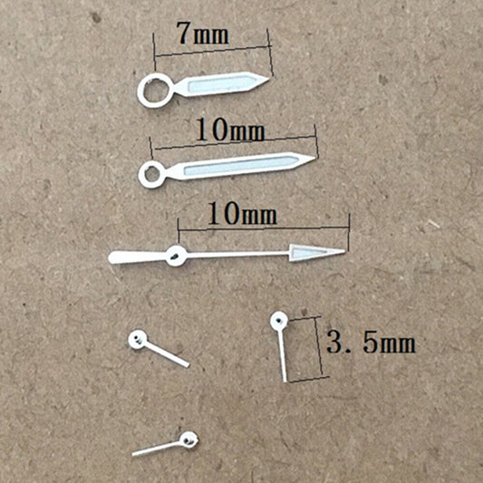 Silver trim green lume watch hands designed for ISA 8162 and ISA 8172 silver quartz movements.