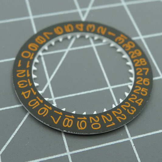 Orange font date disk wheel on black background, compatible with NH35 watch movement, ideal for date display replacement.