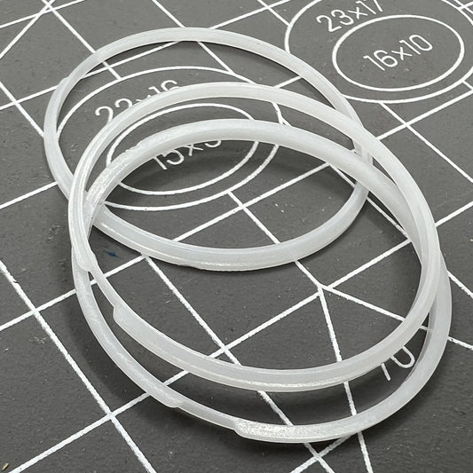 White cushion-shaped spacer ring for 7009 movement watch dials, precise fit.