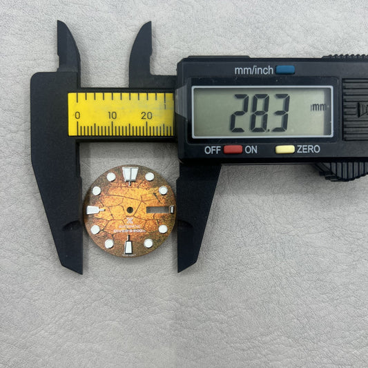 Orange 28.5mm dial with green luminous markers for NH35 NH36 diving watch movement.