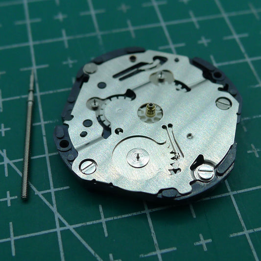 Close-up of Wholesale Hattori Epson VX3NE quartz watch movement, Japan-made precision accessory.