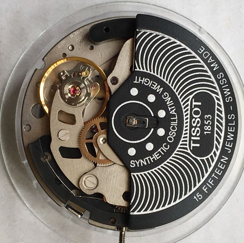 Swiss Made ETA C01.211 chronograph watch movement with black dial, mechanical precision by Tissot 1853.