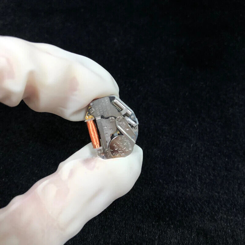 Miyota quartz watch movement with 2 hands, no calendar, ideal for precise watch repairs and upgrades.