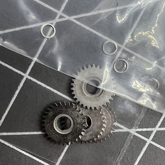Set of 4 Generic Crown Wheels for China Made 7120 Watch Movement, precise replacement parts.