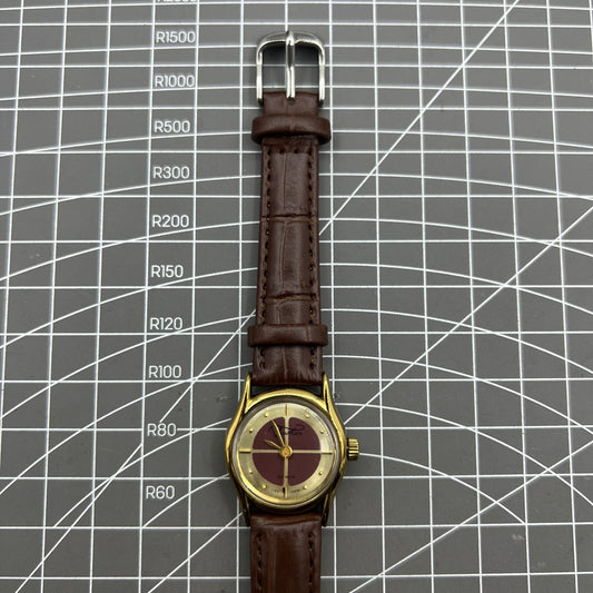 Brown 26mm Liaocheng TAISHAN manual mechanical lady watch with 19 jewels and golden nail details