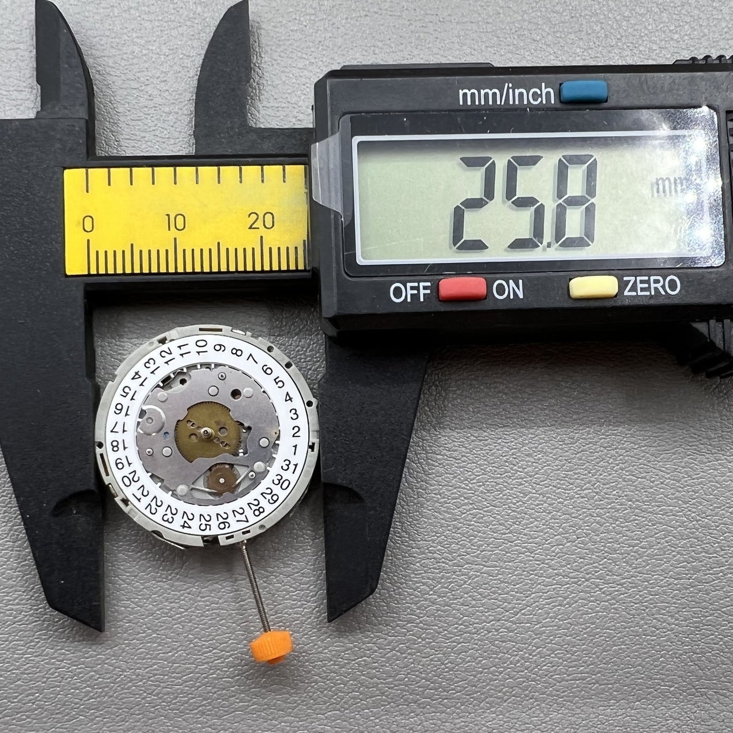 M921 Quartz watch featuring 3 eye subdials and small seconds at 2, 6, 10 o?clock positions.