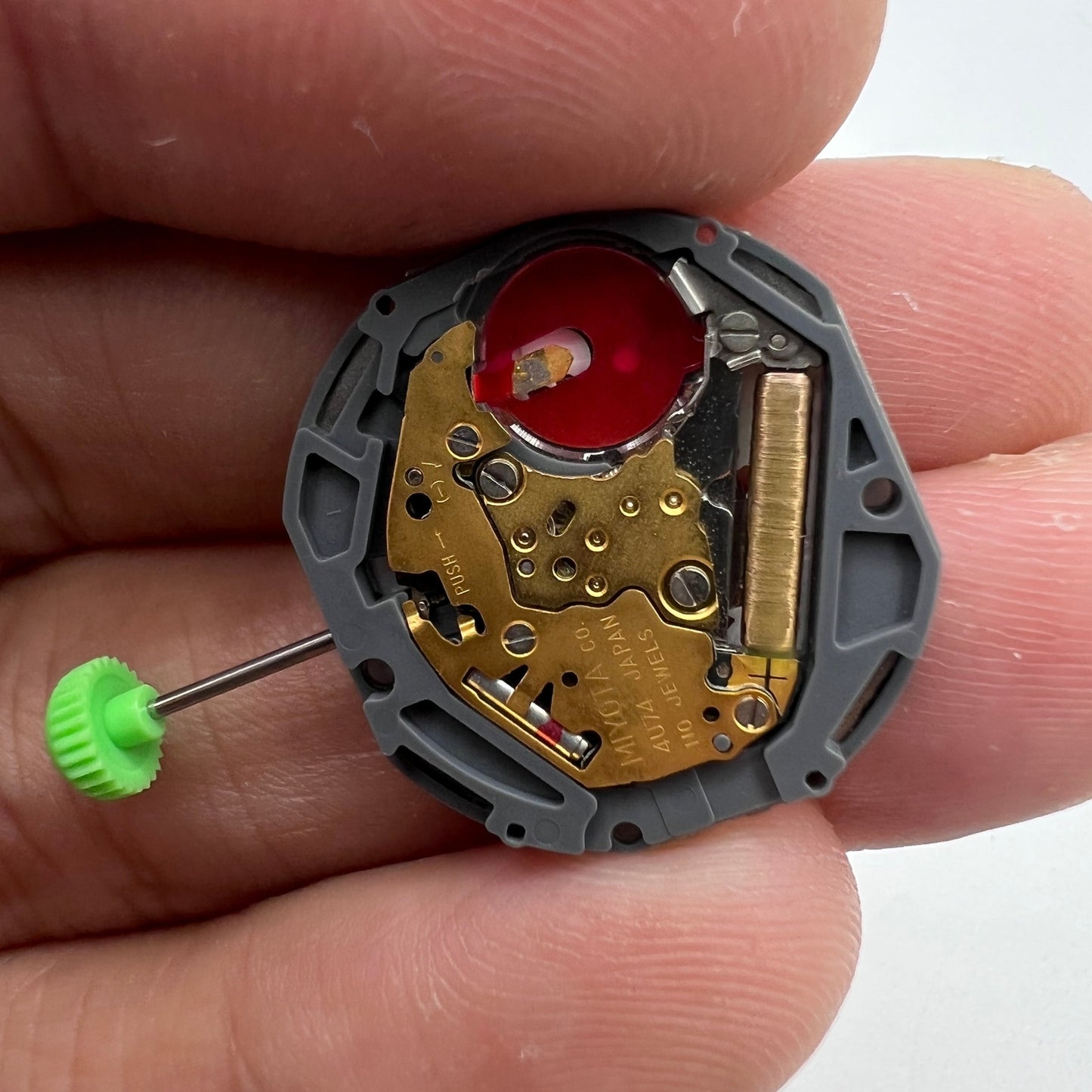 Miyota 4U74 quartz watch movement with date at 6 o?clock, Japan-made for precise timekeeping.