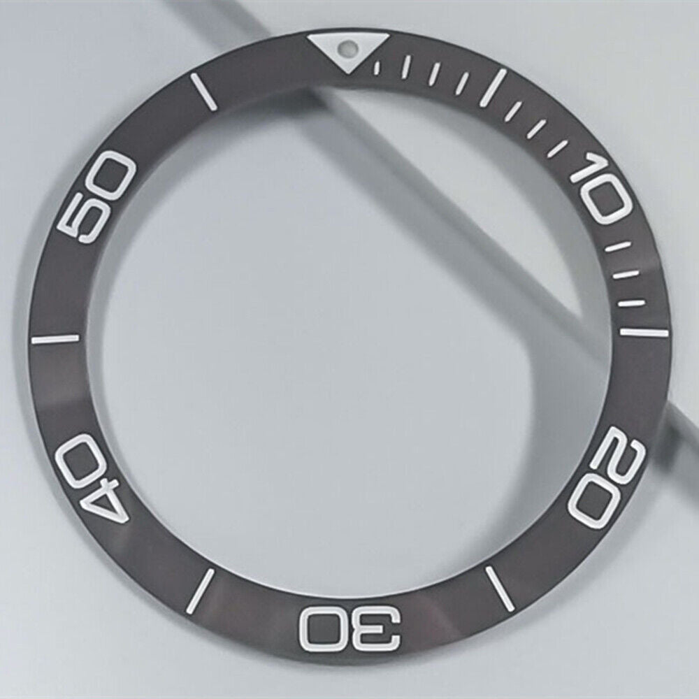 Ceramic blue luminous bezel ring by Conquest for 38.5mm watch, enhancing style and durability.