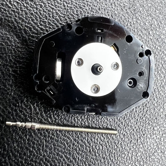 Hattori Epson PC21 quartz watch movement showing precise internal mechanism for timekeeping.
