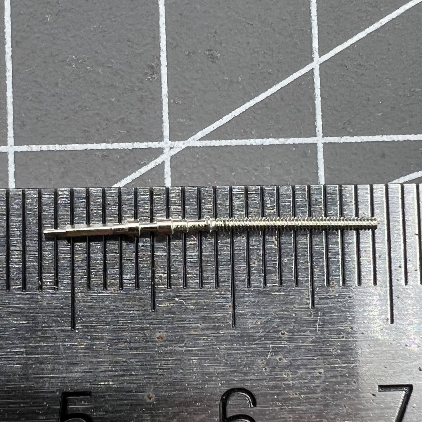 Generic watch winding stem for Orient 46941 movement, precise fit for easy watch repair and replacement.