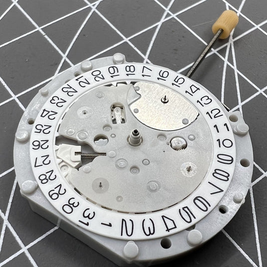 SL70 Quartz watch movement featuring small second subdials at 3, 6, and 9 positions for precise timekeeping.