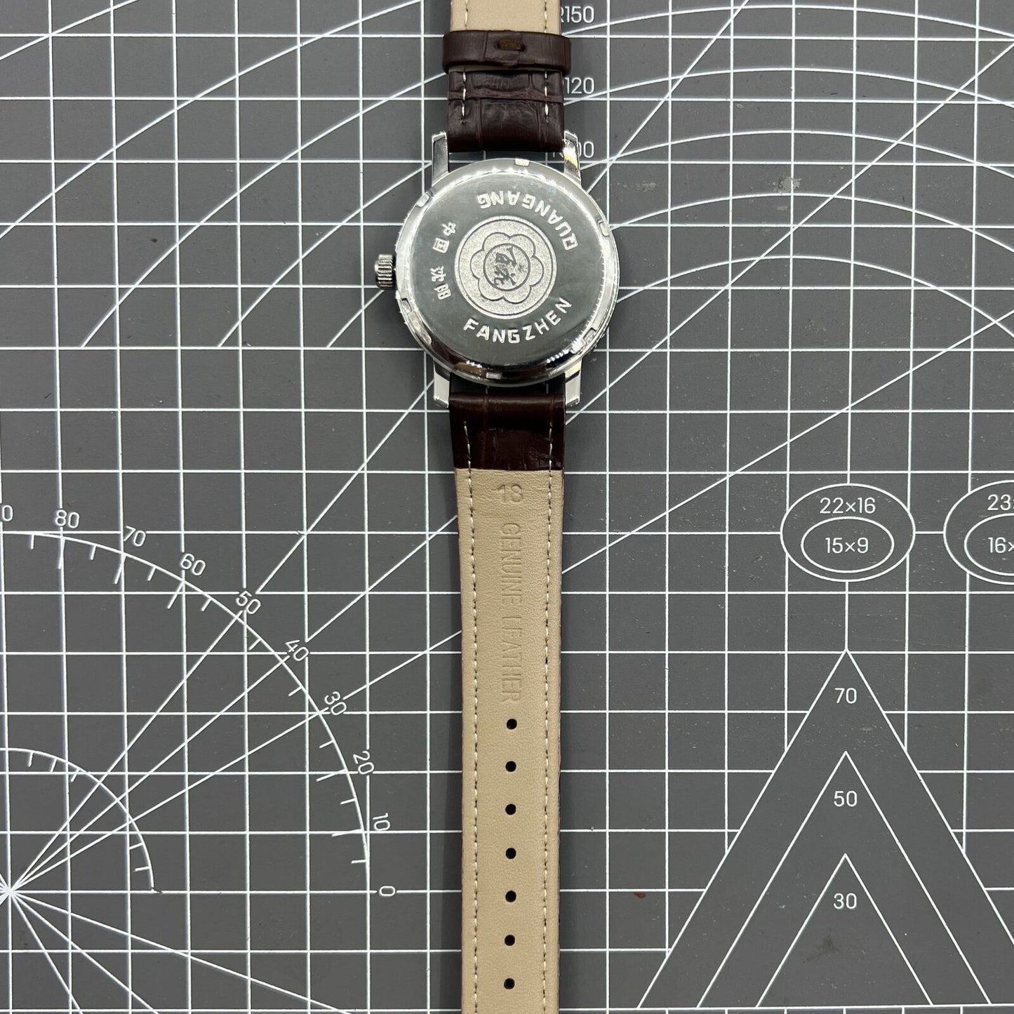 China Baihua 37mm manual mechanical watch with silver dial, 19 jewels, shock-resistant for durable precision timing.