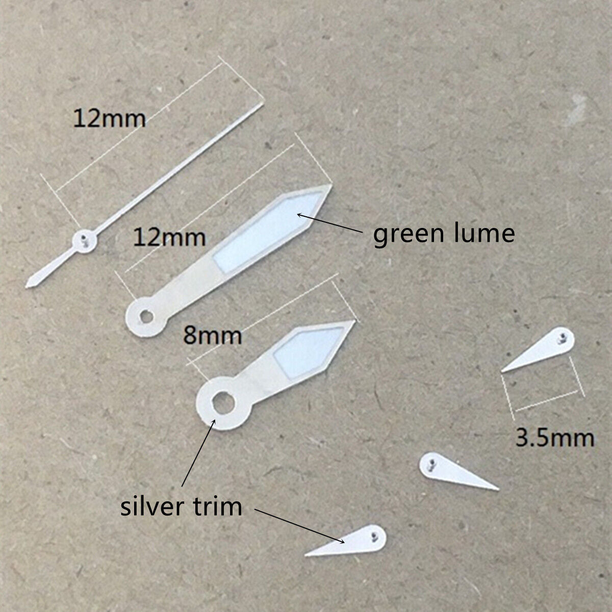Aiguilles de montre luminescentes vertes 12 x 12 x 8 mm avec garniture argentée pour mouvement Hattori VD53, VD54 et VD57