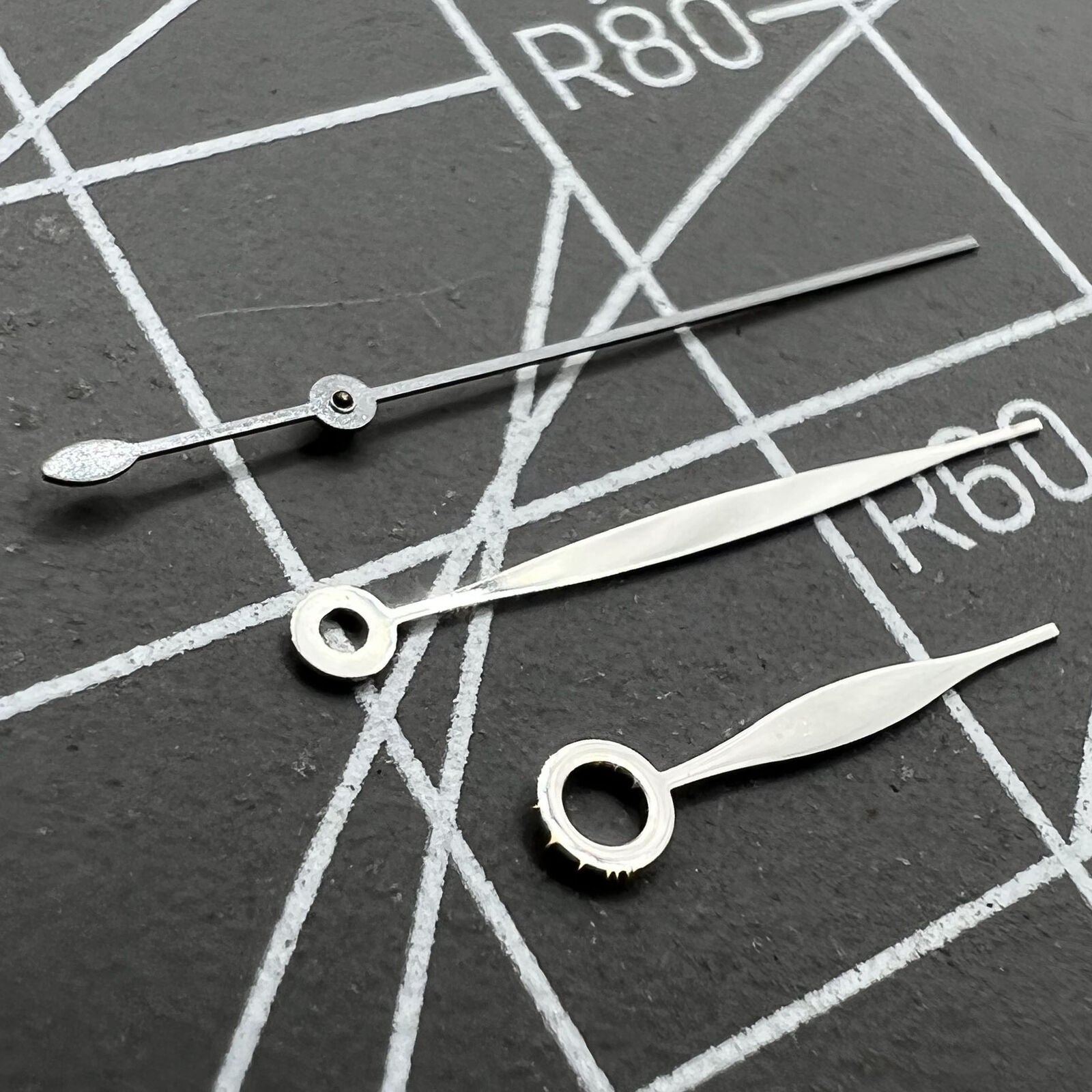 Silver matte watch hands sized 10.5x16x16mm for Tissot 1853 T41 T006 movement, precise replacement accessory.